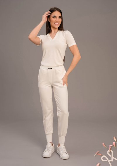 Vajszínű sportos elasztikus puntó nadrág passzéval